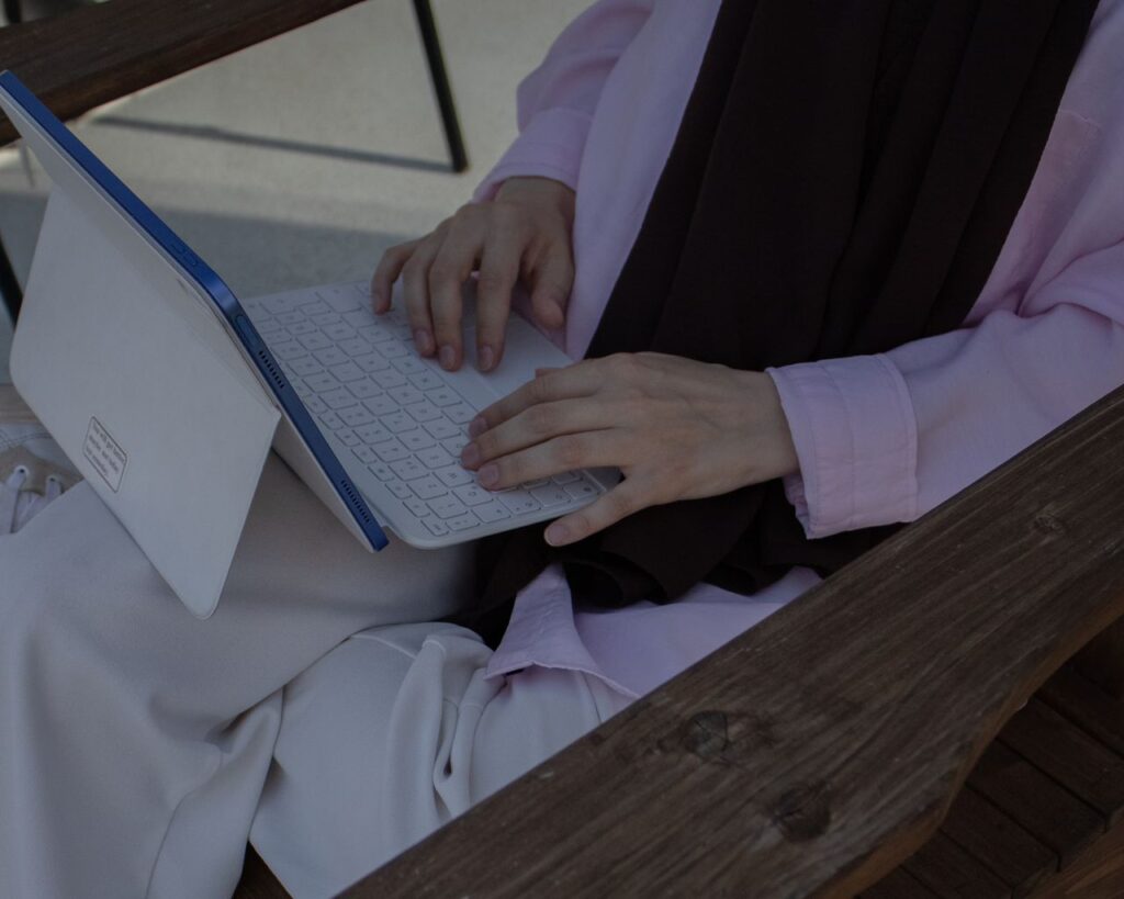 A woman with laptop and making content for digital marketing